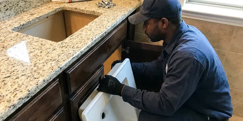 CKV Plumbing technician providing bathtub faucet replacement in Burlington